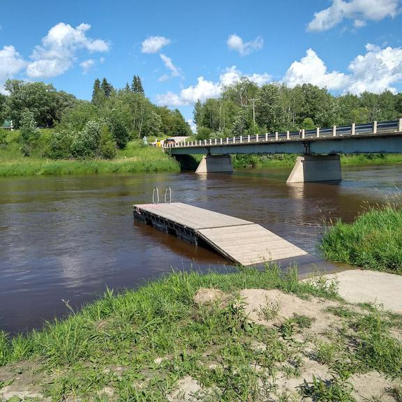 Dock and the Whitemouth River at River Hills Beach