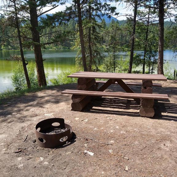 Picnic table and fire pit at Lillian Lake