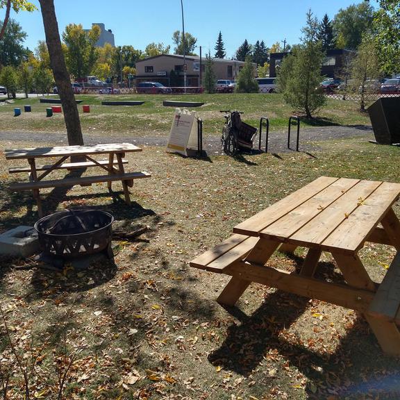 Picnic table and fire pit at Mills Park