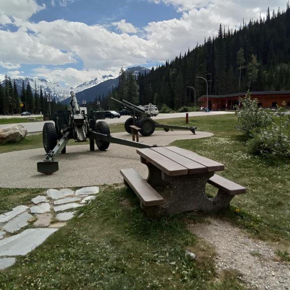 Picnic tables and howitzer at Roger's Pass