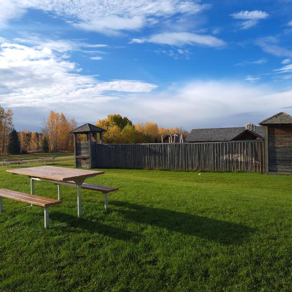 Fort and picnic tables at Rocky Mountain House National Historic Site