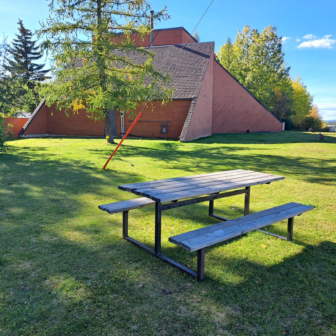 Picnic table and washrooms at Edson Rest Area