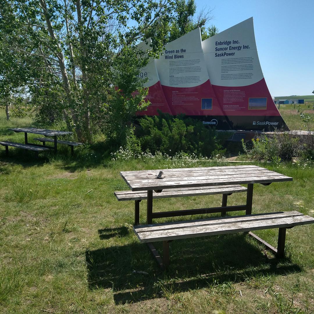 Picnic table and interpretive sign about wind power at Gull Lake Rest Area