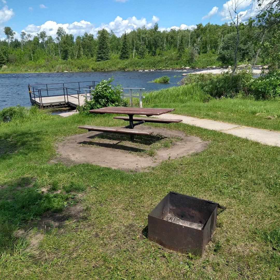 Picnic table and fire pit at Rainbow Falls