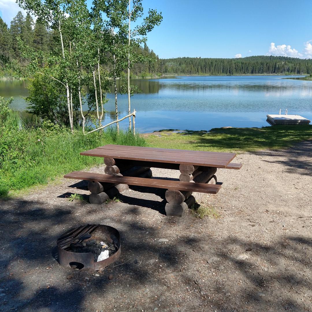 Picnic table and fire pit at Lillian Lake